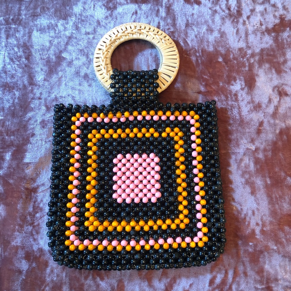 Beaded bag with bamboo handle
